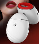 A sleek, white electric lip plumping device featuring a compact design with a single button interface and a contoured lip suction cup at the top.