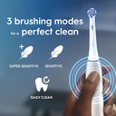 Oral-B iO2 Electric Toothbrush, 1 Gentle Care Toothbrush Head, 1 Travel Case, 1 Travel Refill Holder, Toothbrush for Adults (Calm Pink), Designed by Braun