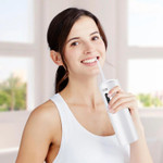 A sleek, cordless water flosser with a modern design, featuring a comfortable grip and a detachable water reservoir, ideal for deep-cleaning teeth and gums. A sleek, cordless water flosser with a modern design, featuring a comfortable grip and a detachable water reservoir, ideal for deep-cleaning teeth and gums.