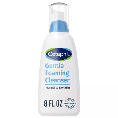 An 8 fl oz bottle of Cetaphil Gentle Foaming Facial Cleanser with Glycerin, featuring a self-foaming pump and the brand's signature white and blue packaging.