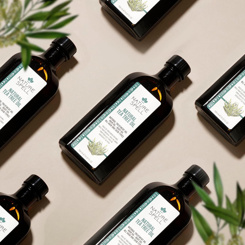 Nature Spell Tea Tree Oil for Hair & Skin 150ml  Hair Oil for Itchy Scalp, Deeply Nourishing - Skincare Oil to Reduce Skin Irritation, Redness, and Inflamed Skin  Made in the UK