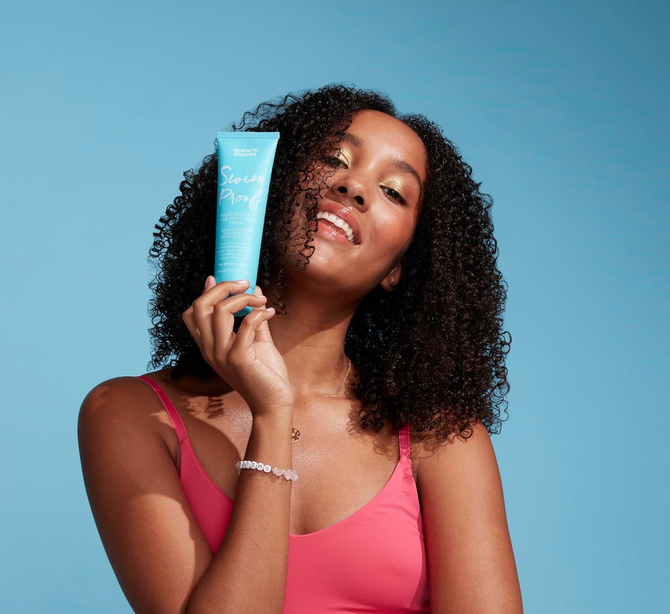 Umberto Giannini Swim Proof Hair Protecting Cream 150ml - Leave in Hair Cream with UV Protection - Prevents Damage from Sun, Sea & Chlorine. Infused with Coconut & Olive Oil. Vegan & Cruelty Free Umberto Giannini Swim Proof Hair Protecting Cream 150ml - Leave in Hair Cream with UV Protection - Prevents Damage from Sun, Sea & Chlorine. Infused with Coconut & Olive Oil. Vegan & Cruelty Free