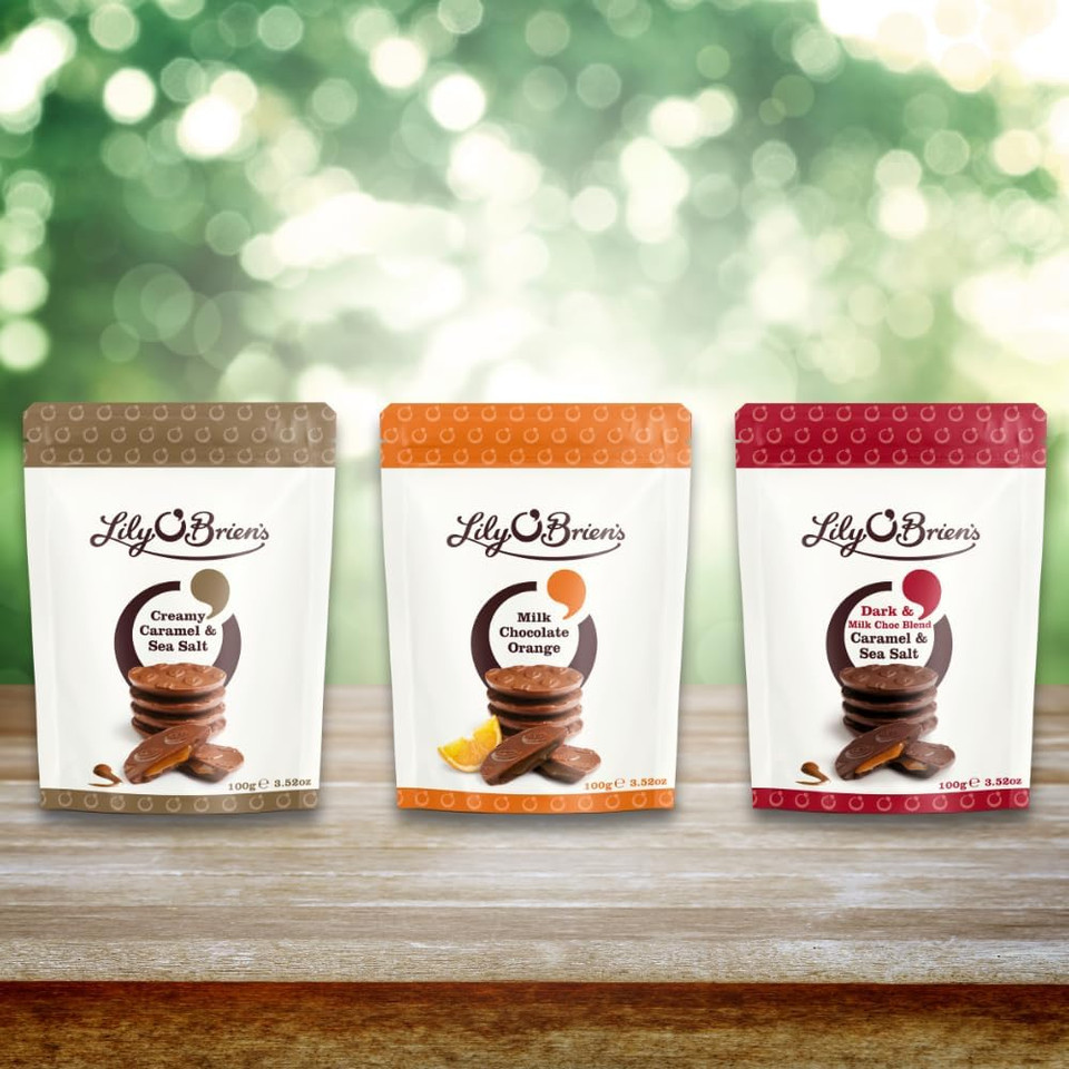 Lily O'Brien's Milk Chocolate Orange Share bag 100g - Vibrant & zesty this super choc is full of life- Premium share bag, ideal for hampers, snack, treat, sharing occasion