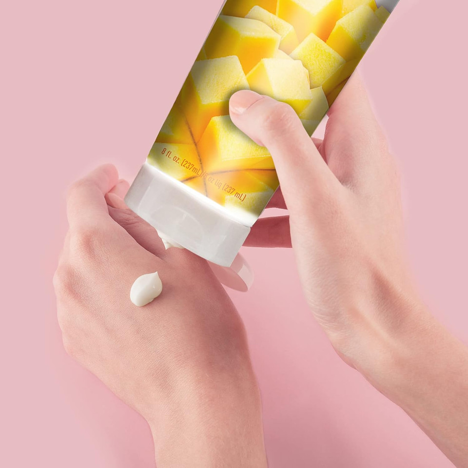 Desert Essence, Island Mango Hand & Body Lotion 8 Fl. Oz. - Gluten Free - Vegan - Cruelty Free - Mango Seed Butter, Passion Flower & Organic Shea Butter - Luscious & Rich - Tropical Island Scent