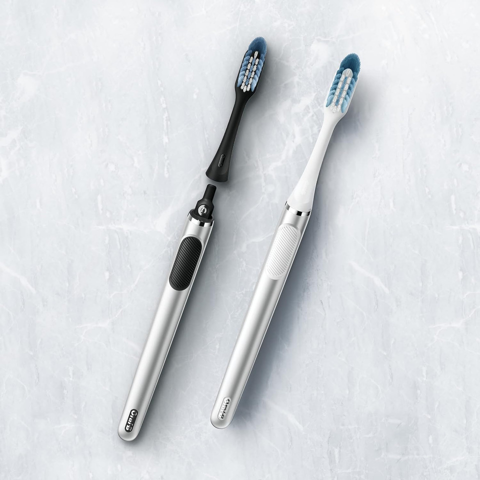 Oral-B Clic Toothbrush, Chrome Black, With 1 Bonus Replacement Brush Head And Magnetic Toothbrush Holderchrome Black