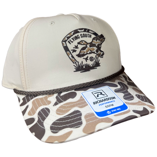 Little River Flying South Richardson 258 hat in tan with camo bill, brown rope, and embroidered flying mallard design.