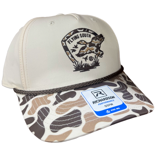 Little River Flying South Richardson 258 hat in tan with camo bill, brown rope, and embroidered flying mallard design.