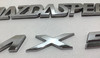 2004-2005 Mazdaspeed Miata Rear Badges Trim / OEM  /   NB189