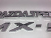 2004-2005 Mazdaspeed Miata Rear Badges Trim / OEM  /   NB260
