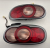 2001-2005 Mazda Miata OEM Tail Lights w/ Surround Trims / Pair / Titanium Gray Metallic  NB273