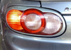 2001-2005 Mazda Miata OEM Tail Lights w/ Surround Trims / Pair / Titanium Gray Metallic  NB273