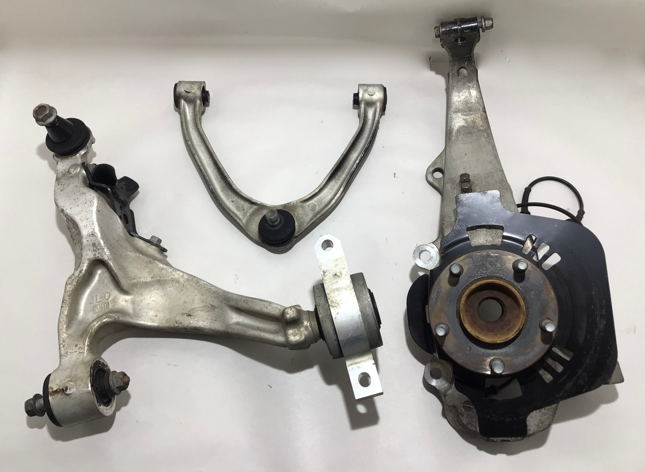 2009-2012 Nissan 370Z Driver Front Knee Spindle Hub w/ Control