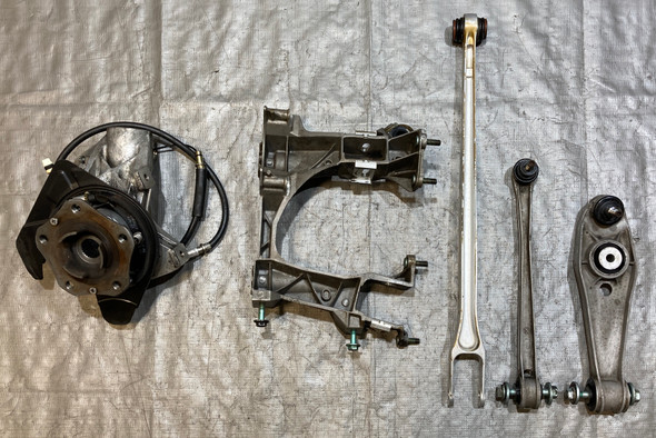 1997-2004 Porsche 986 Boxster 2.7 Passenger Rear Knee Spindle Hub w/ Control Arms / Subframe Bracket / 24K BX068