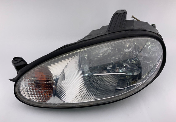 1999-2000 Mazda Miata Driver Side Headlight  /   NB264