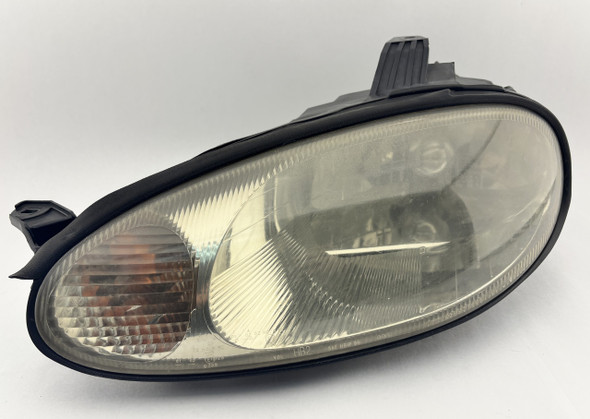 1999-2000 Mazda Miata Driver Side Headlight  /   NB282