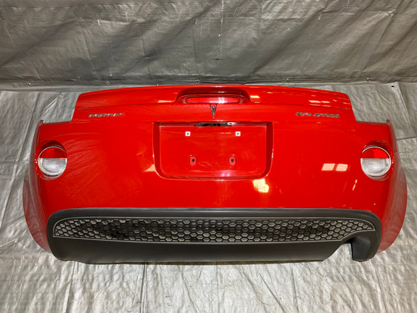 2006-2009 Pontiac Solstice 2.4l Rear Bumper Cover w/ Valance / Spoiler / Aggressive Red PS048