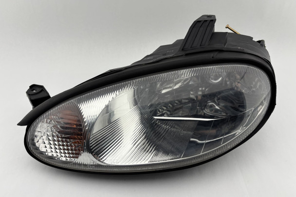 1999-2000 Mazda Miata Driver Side Headlight  /   NB270