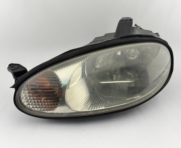 1999-2000 Mazda Miata Driver Side Headlight  /   NB277