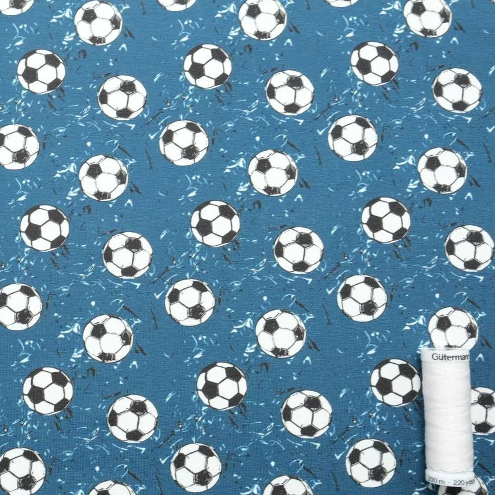 Soccer Balls on Blue Cotton Lycra Knit