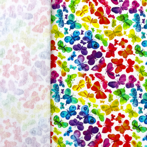 Rainbow Butterflies on White Cotton Lycra French Terry Rainbow Butterflies on White Cotton Lycra French Terry