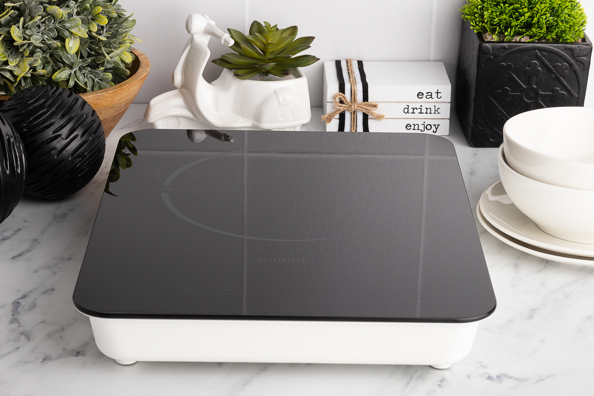 Elevate your cooking experience with ZONOHM's Portable Induction Cooktops | Efficient, Portable, and sleek design for your gourmet meals. Discover precision cooking today!