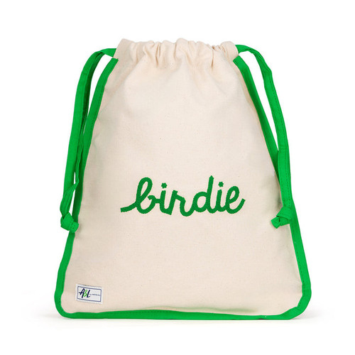 Front view of natural canvas shoe bag with green trim and the word "birdie" embroidered on the front in green.