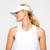 Woman wears white visor with blue and navy striped adjustable strap on the back.