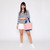 view of coral mini surfside tote with navy straps