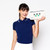 woman holds small tan canvas makeup pouch with navy and green golf ball and tees printed on front