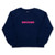Navy kids sweatshirt lays flat on a white background. Pink hearts with the word tennis over them is embroidered on the front of the sweatshirt