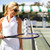 White water bottle with navy crossed racquets and lime tennis balls printed on it