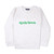 White sweatshirt lays flat on white background with green text reading apres tennis embroidered on the front