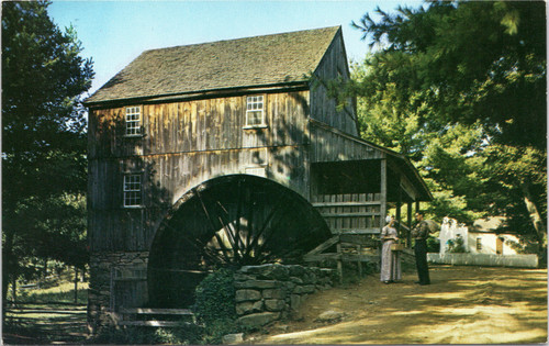 Old Sturbridge Village - Grist Mill - man and woman talking