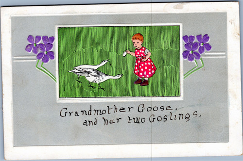 Girl in red dress with white polka dots feeding two geese