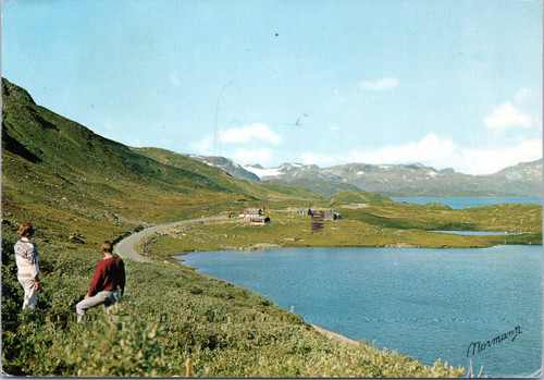 Tyin-Ardal Road - View across lake Tyinvatnet towards Jotunheimen mountains