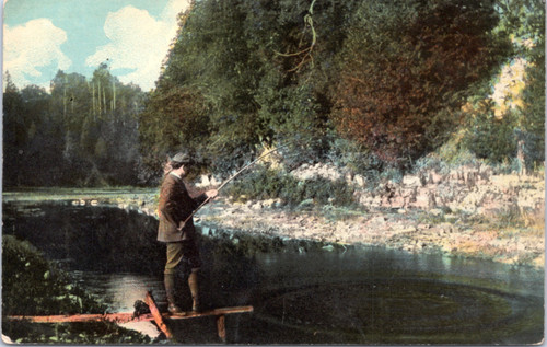 Man fishing in creek