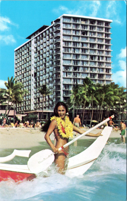 Outrigger Hotel, Waikiki Honolulu Hawaii - Woman with paddle in surf