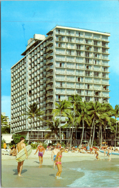 Outrigger Hotel, Waikiki Honolulu Hawaii - beach scene surfer looking at girl