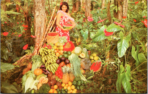 Woman amongst fruist and vegetables