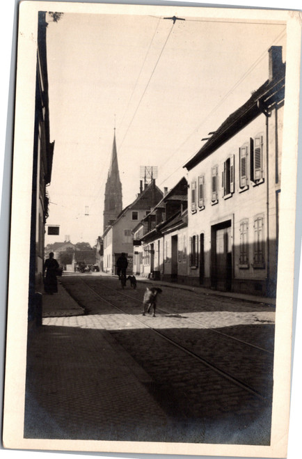 RPPC Germany Oggersheim Schillerstrasse dog in middle of street