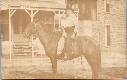 RPPC KS Man on Horseback - Peerless Prophets Wichita sign shop  1909 Pawnee OK
