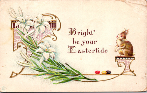 Eastertide bunny on pedestal lillies