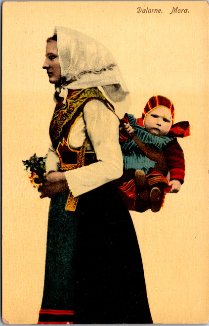 Mora Sweden - Mother carrying child on back in traditional folk dress