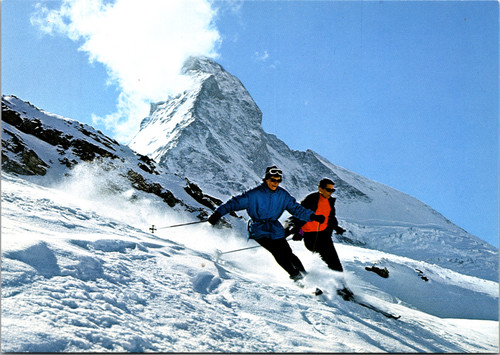 Skiiers with Matterhorn in background