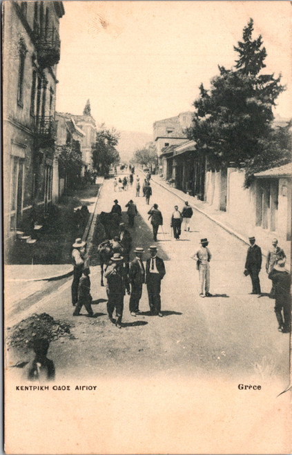 Aigio Greece – Central Street Scene with People & Donkeys Aigio Greece – Central Street Scene with People & Donkeys