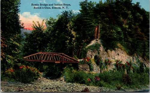Vintage postcard showing Rustic Bridge and Indian Steps at Rorick’s Glen Elmira New York, with wooden bridge and stairway through forested hillside.