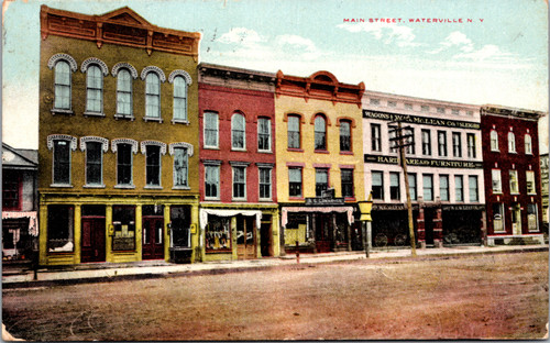 Early color postcard showing ornate storefronts along Main Street in Waterville New York mailed in 1918