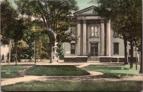 Color postcard of Oswego County Court House and Jail Pulaski New York showing classical columned courthouse and fountain in park setting