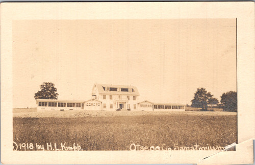 Real photo postcard of Otsego County Sanatorium Mount Vision New York dated 1918 by H.L. Knapp showing large sanatorium building with long porches and surrounding farmland.