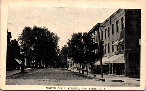 North Main Street New Berlin New York early storefronts and dirt road streetscape